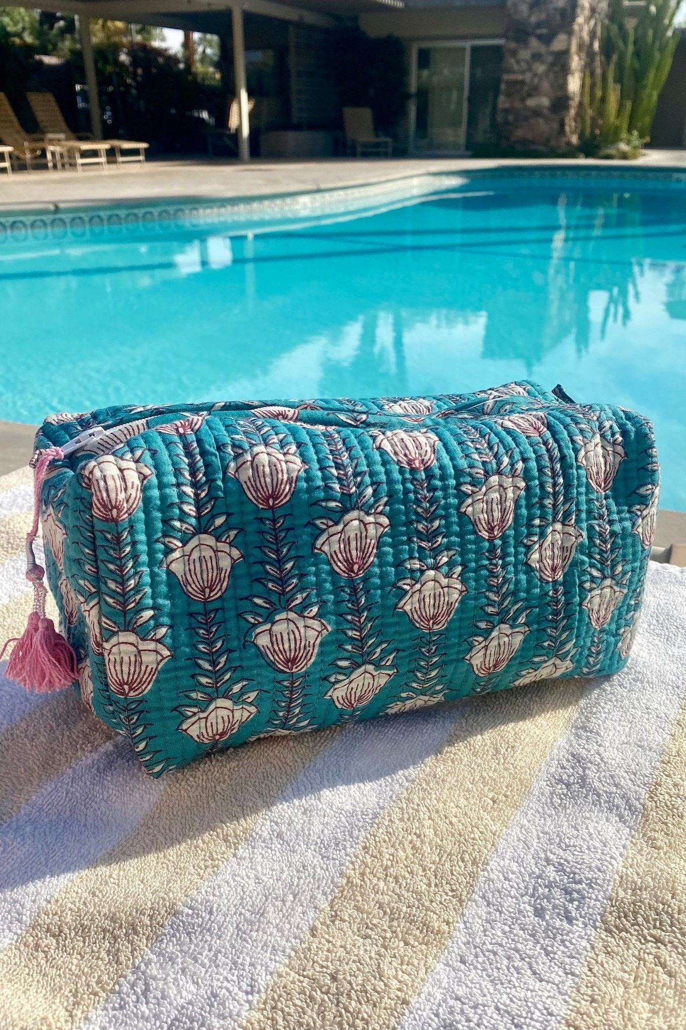 lourdes teal wash bag